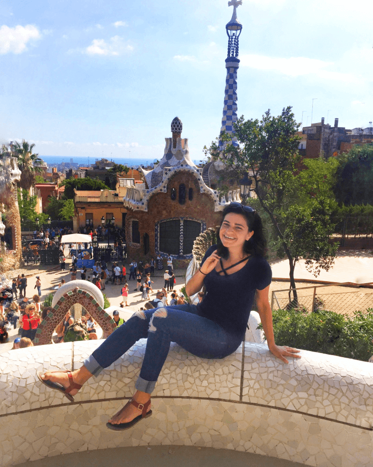 woman-sitting-park-guell-barcelona