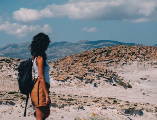 woman-looking-out-at-desert